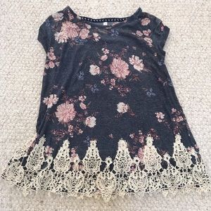 Navy blue top with floral pattern and lace.